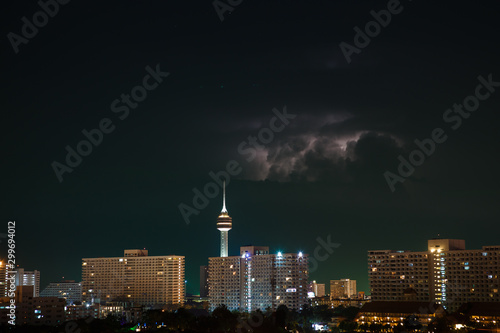 Night city, thunderstorm, lightning. Pattaya