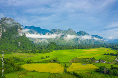 Aerial view of beautiful landscapes at Vang Vieng , Laos. Southeast Asia. Photo made by drone from above. Bird eye view. © Curioso.Photography
