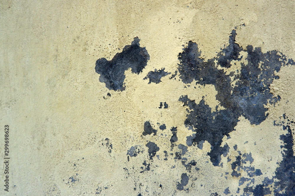 Old weathered painted wall background texture. Green dirty peeled plaster wall with falling off flakes of paint.Peeling paint on a metal surface.Cracked paint damaged concrete rough texture. Old weathered painted wall background texture. Green dirty peeled plaster wall with falling off flakes of paint.Peeling paint on a metal surface.Cracked paint damaged concrete rough texture.