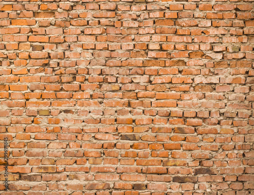 Texture of an old wall with red brick for background.
