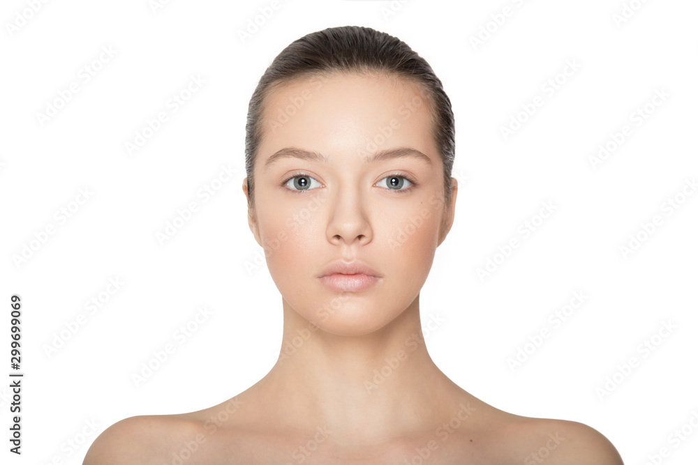 Frontal portrait of young woman brunette, skin care, free make-up, isolated on white background. Caucasian model. Frontal portrait of young woman brunette, skin care, free make-up, isolated on white background. Caucasian model.