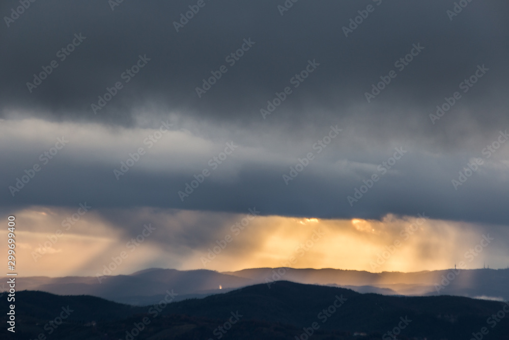 Sunrays coming over mountains in Umbria (Italy) with beautiful golden hours colors. Sunrays coming over mountains in Umbria (Italy) with beautiful golden hours colors.