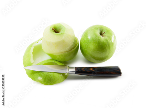 peeled green Apple with fruit knife