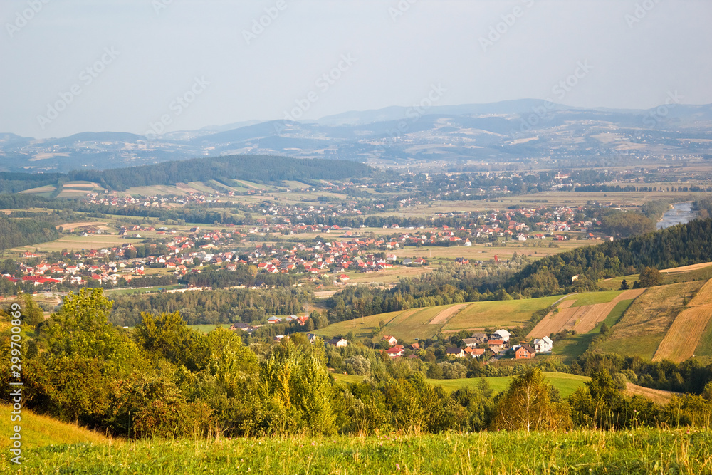 Village Barcice and Stary Sącz Town. View from village Wola Krogulecka, Poland.