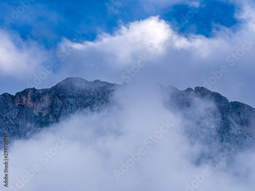 Highest Mountain in Germany with a view to the top and surrounding clouds