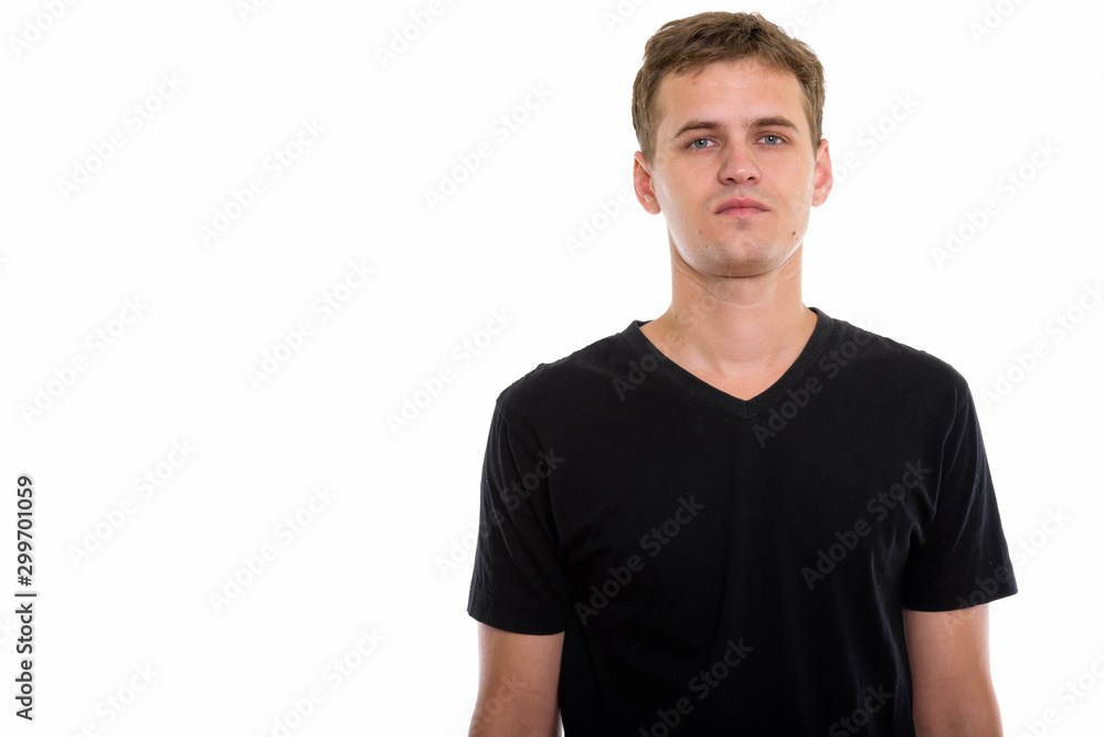 Studio shot of young man isolated against white background Studio shot of young man isolated against white background