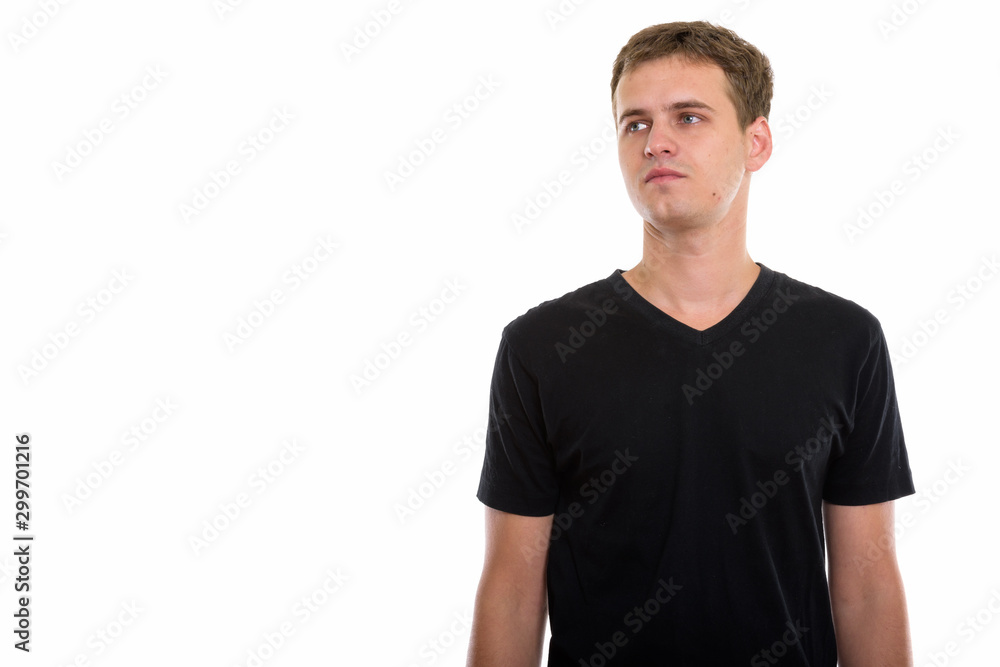 Studio shot of young man isolated against white background Studio shot of young man isolated against white background