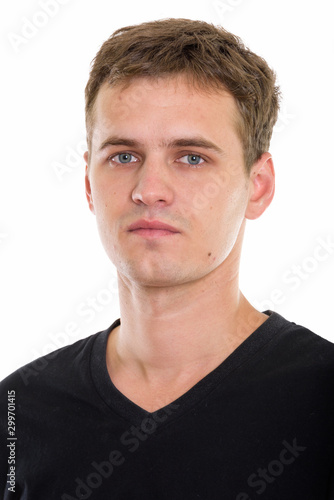 Studio shot of young man isolated against white background