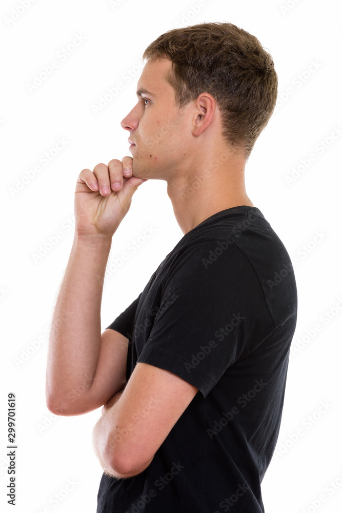 Studio shot of young man isolated against white background Studio shot of young man isolated against white background
