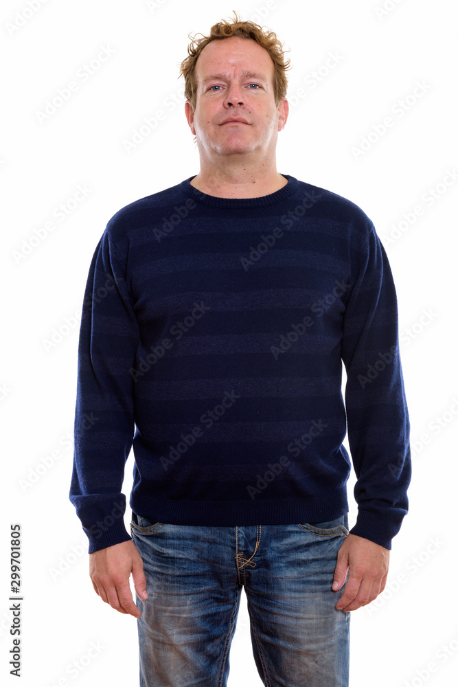 Studio shot of mature man with curly blond hair isolated against white background Studio shot of mature man with curly blond hair isolated against white background