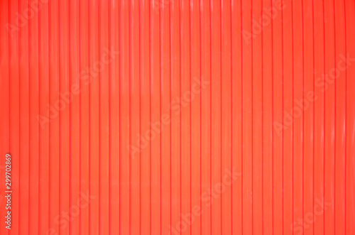 Colorful bright red wall in line vertical seamless patterns on background © Amphawan