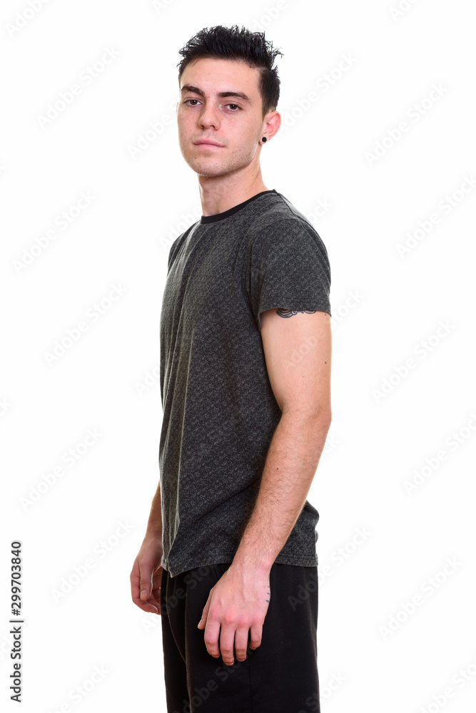 Studio shot of young handsome man isolated against white background Studio shot of young handsome man isolated against white background