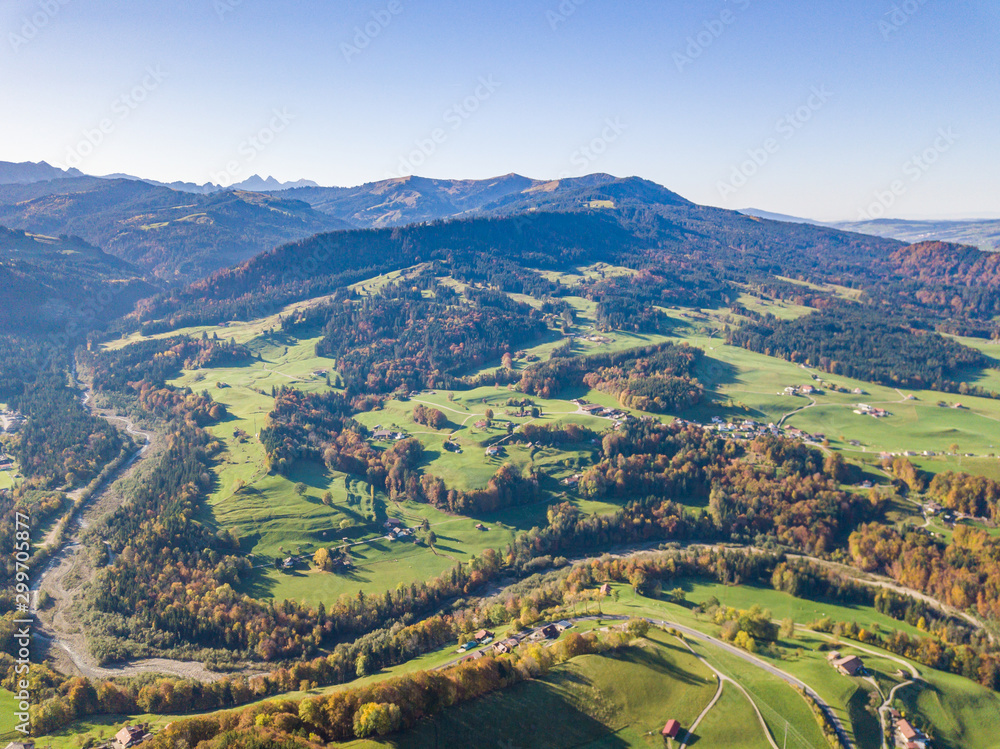 Aerial view of Swiss countryside. Pre-alpine landscape in Switzerland. Peaceful farmland in rural area.