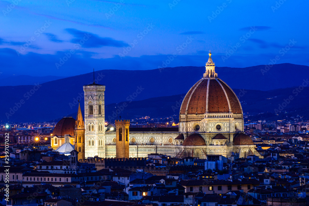 The Duomo (Cathedral of Santa Maria del Fiore) Rising Above the City at Night, Florence, Italy