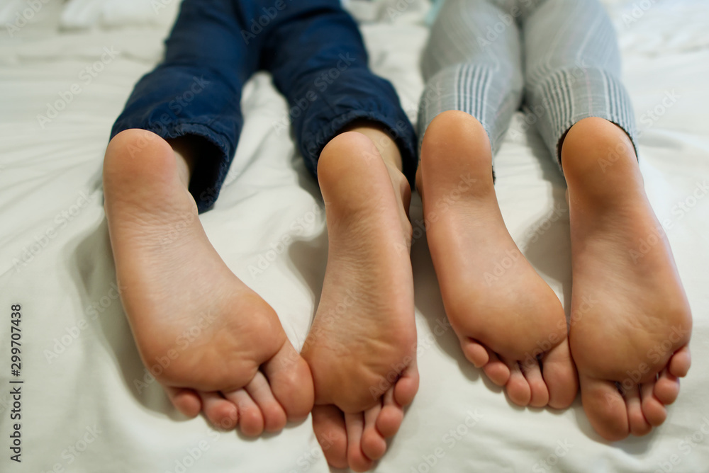 Children Lying In Bed Kids Feet Close up Stock Photo Adobe Stock