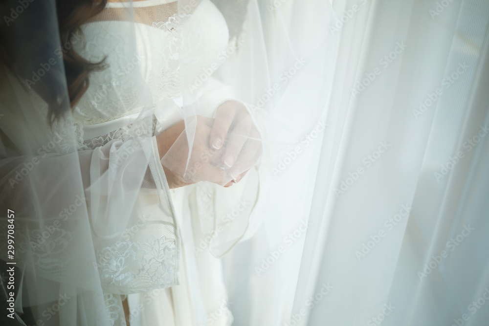 Beautiful bride in a white coat on a wedding day Beautiful bride in a white coat on a wedding day