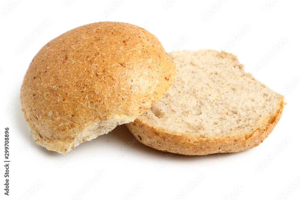 Halves of Graham Bread Roll. Isolated on white background. Halves of Graham Bread Roll. Isolated on white background.