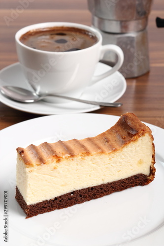 Cheesecake and coffee cup. Macro.