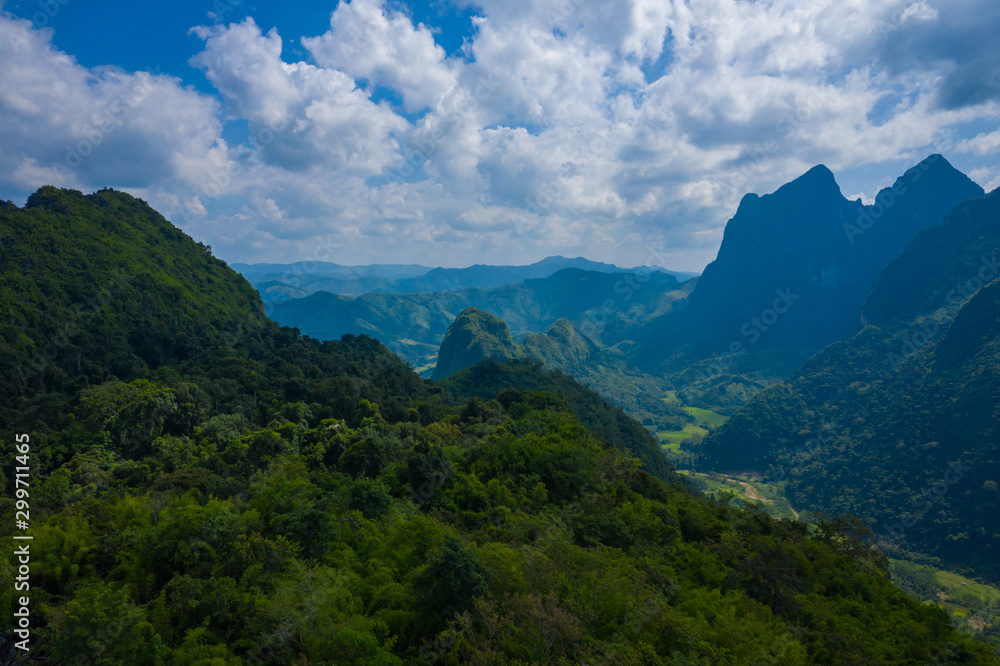 Aerial view of mountains in Nong Khiaw. North Laos. Southeast Asia. Photo made by drone from above. Bird eye view. Aerial view of mountains in Nong Khiaw. North Laos. Southeast Asia. Photo made by drone from above. Bird eye view.