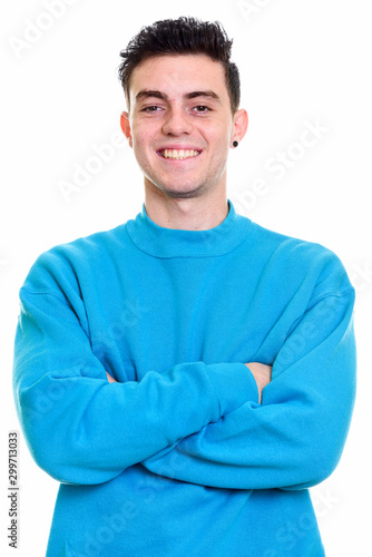 Studio shot of young handsome man isolated against white background