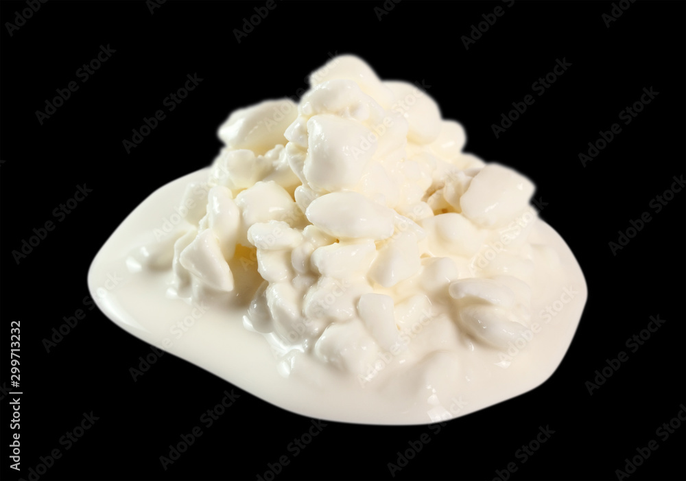 Cottage Cheese. Isolated on black background.