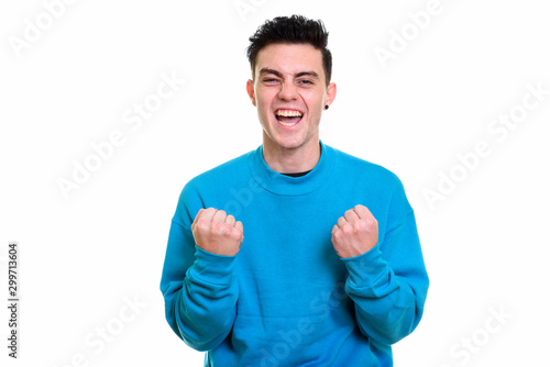 Studio shot of young handsome man isolated against white background