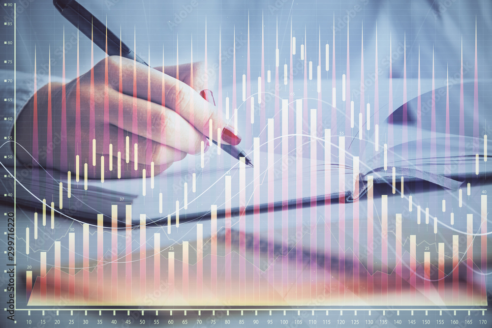 Multi exposure of woman's hands making notes with forex graph hologram. Concept stock market analysis. Multi exposure of woman's hands making notes with forex graph hologram. Concept stock market analysis.