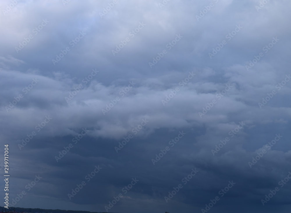 Obraz premium Heavy rain clouds. Photography, atmospheric phenomena, panoramic image of the autumn sky.