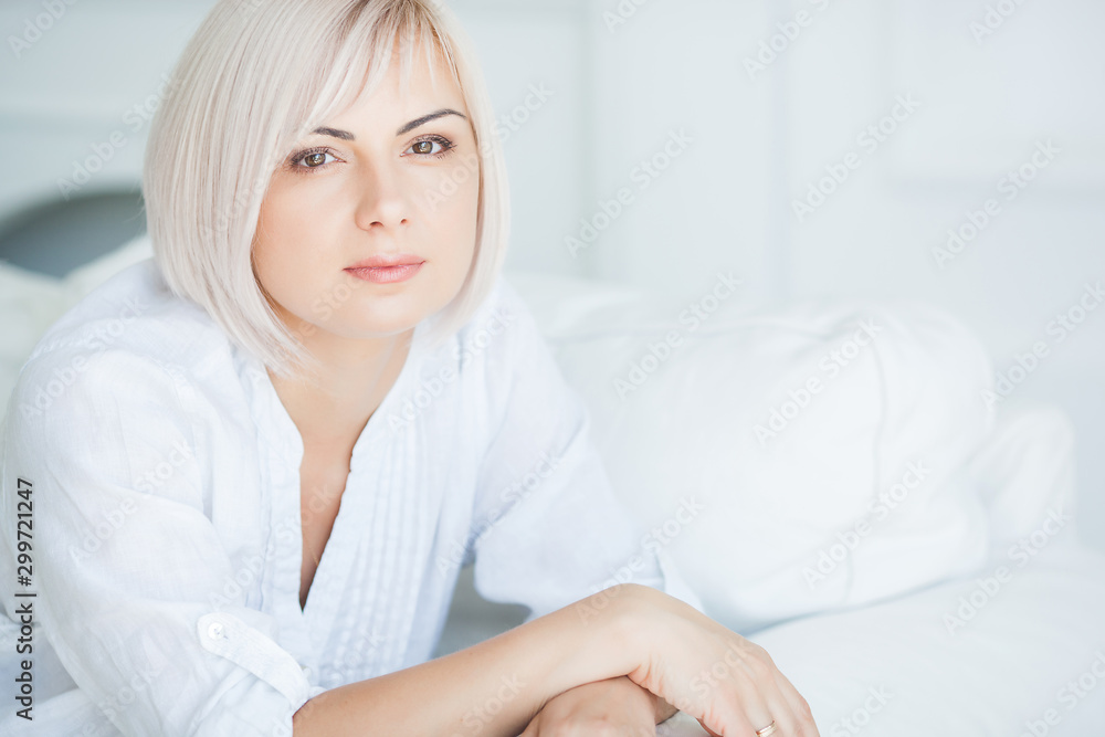 Attractive mature woman portrait. Female indoors. Beautiful blond middle adult woman closeup portrait. Attractive mature woman portrait. Female indoors. Beautiful blond middle adult woman closeup portrait.