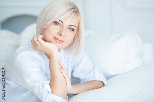 Free Download Attractive mature woman portrait. Female indoors. Beautiful blond middle adult woman closeup portrait. - GFXLoad