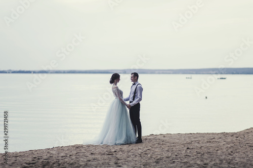 Young couple enjoying outdoors. wedding style. romantic and love © jozzeppe777