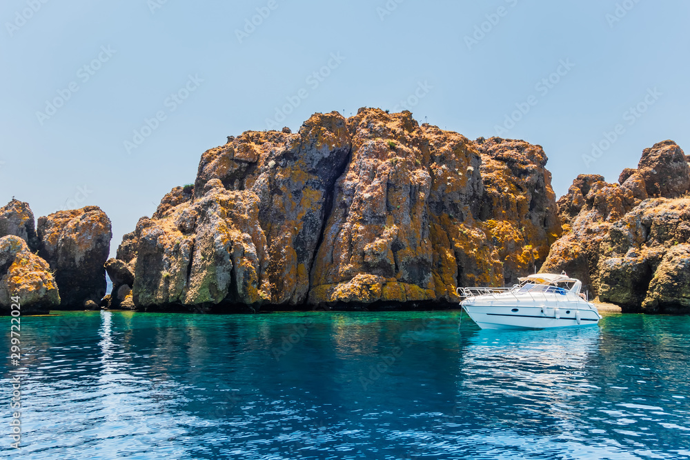 Luxury yachts at anchor coast Rocks Luxury yachts at anchor coast Rocks