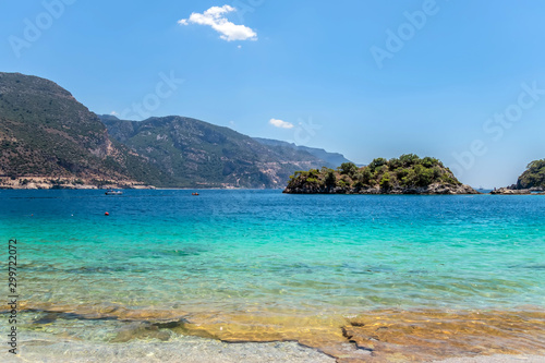 green island with hills Aegean Sea near Marmaris, Turkey © Emoji Smileys People