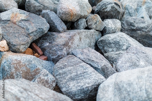 Canvas Print Closeup of a pile of stones and pebbles