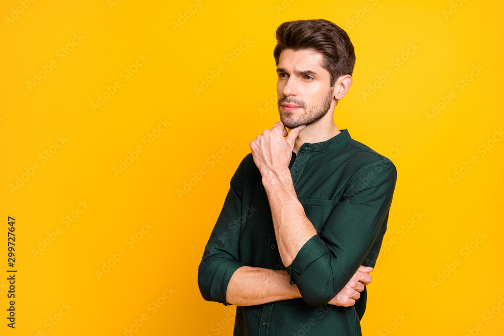 Profile side photo of serious thoughtful guy worker have thoughts about his start-up think tocuh his chin wear good looking clothing isolated over yellow color background Profile side photo of serious thoughtful guy worker have thoughts about his start-up think tocuh his chin wear good looking clothing isolated over yellow color background