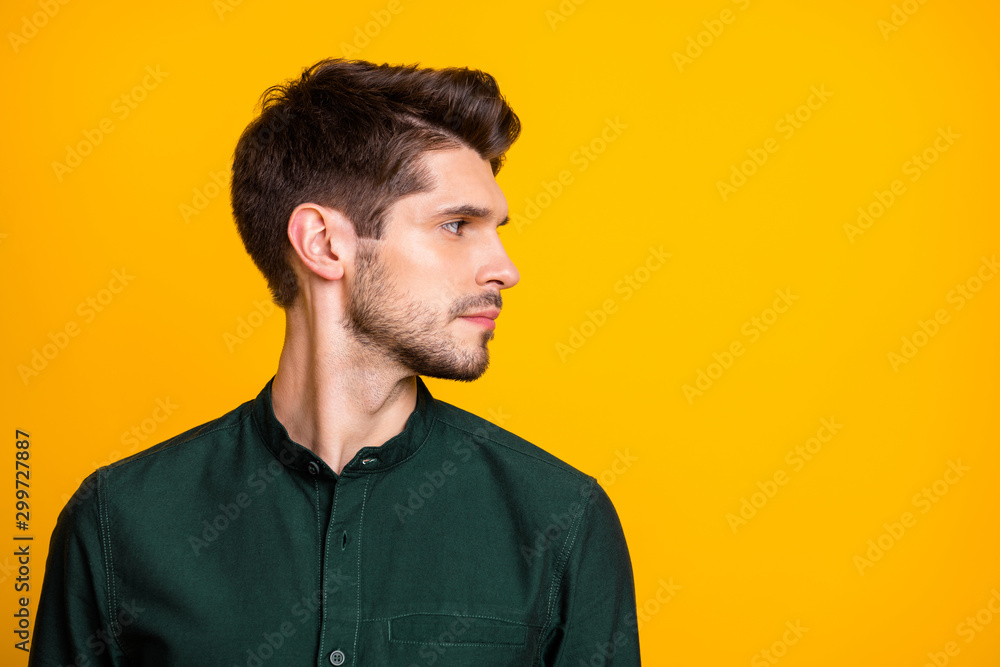 Fototapeta premium Profile side photo of serious concentrated guy look at copyspace hear work job problems want solve wear casual style outfit isolated over yellow color background