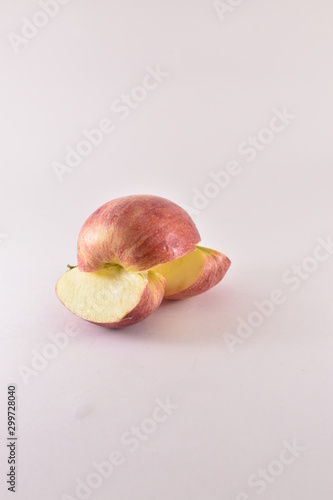 Apples and bananas on white background