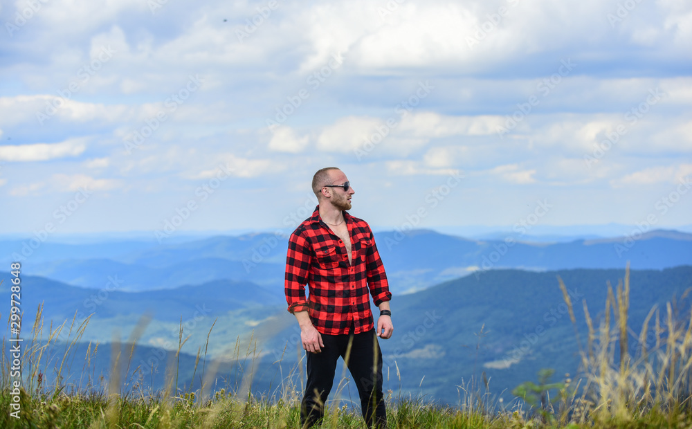 Achieve freedom. Free and wild. Value of freedom. Self sufficient. Man stand on top of mountain. Hiking concept. Active leisure. Guy enjoy freedom. Discover world. Masculinity and male energy