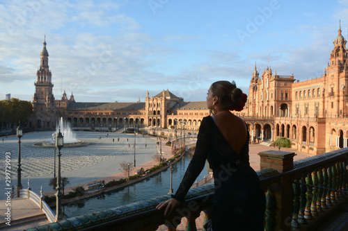 the girl in the flamenco dress facing Plaza de Espana, Sevilla, Spain