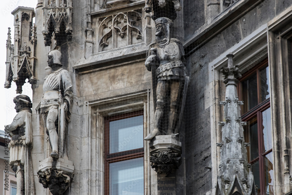  Elements of architecture and statues of the new city hall on Marienplatz in the center of Munich. 