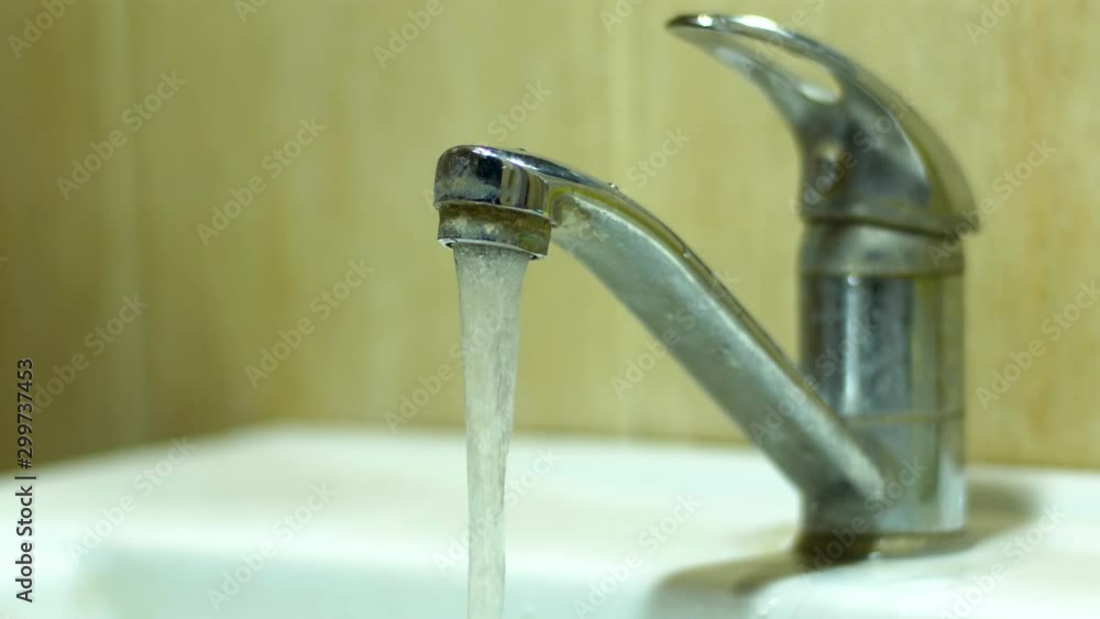 Dirty rusty kitchen faucet. Water drops down. Poor family cant buy new faucet Dirty rusty kitchen faucet. Water drops down. Poor family cant buy new faucet