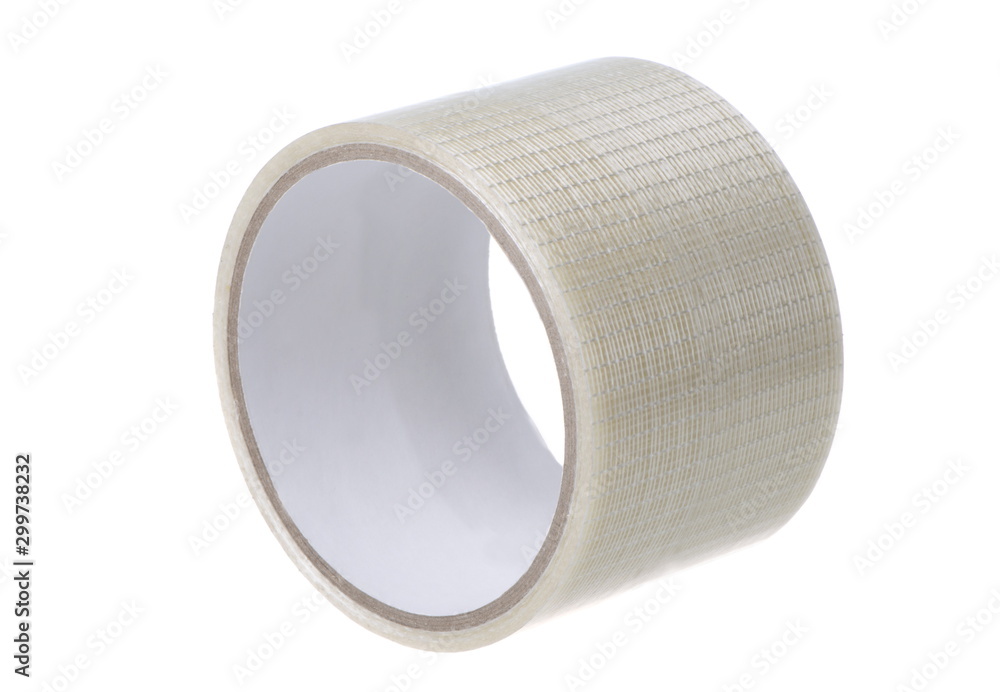 A roll of adhesive tape, close-up on a white background isolated A roll of adhesive tape, close-up on a white background isolated