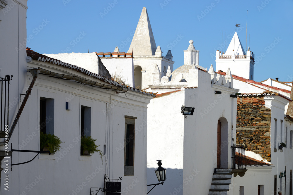 Houses, shops and churches painted white through the streets of the medieval town of Monsaraz in Alentejo, Portugal