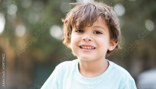handsome child outdoors summer portrait photo