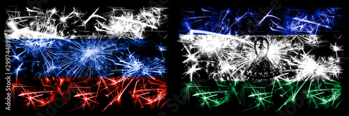 Russia, Russian vs Lesotho New Year celebration sparkling fireworks flags concept background. Combination of two states flags © Vlad