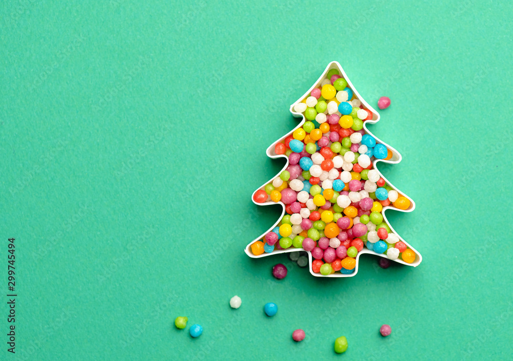 Christmas tree shape made from many colored sweet candies