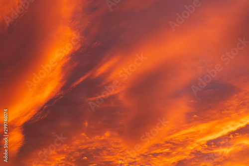 Dramatic fiery sky sunset cloudscape at dusk