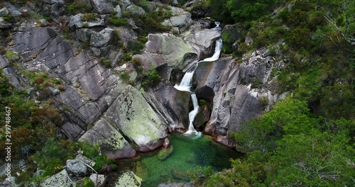 Aerial view of a waterfall near the village of Castro Laboreiro, at the Peneda Geres National Park, in Portugal photo