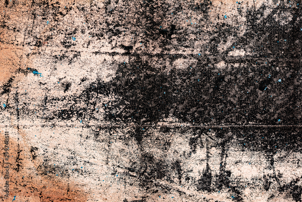 Fototapeta premium Texture of a concrete wall with cracks and scratches which can be used as a background