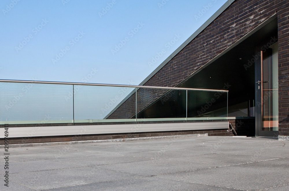 Modern Dutch architecture. Glass panels. Banister. Balcony. Handrail.